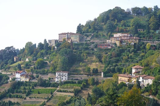 Bergamo. One of the beautiful city in Italy. Landscape at the old town from San Vigilio hill. Amazing view of the towers, bell towers and main churches.