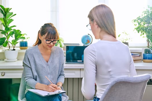 Psychologist, social worker, behavior talking with teenage girl student, counselor with clipboard. Psychology psychotherapy therapy, adolescence youth, social life, mental health concept