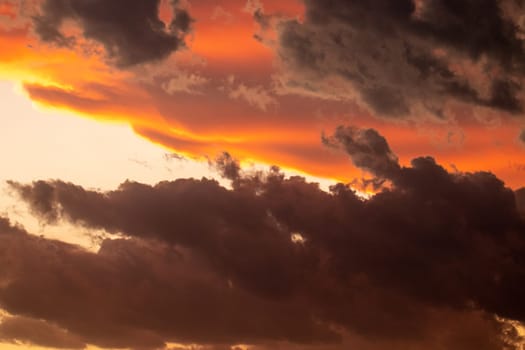 Orange, Black and white dramatic sunset sky line . High quality photo