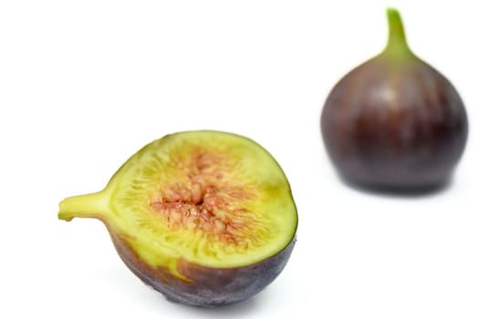 fresh appetizing figs on white background