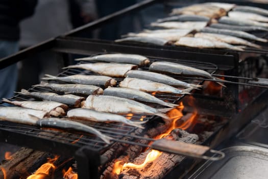 Herring on the grill on a street market