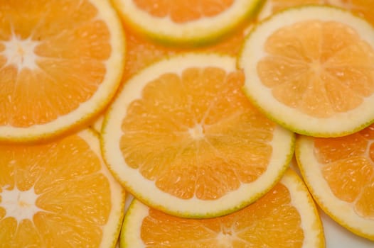 sliced ​​orange laid out on the table as a food background 12