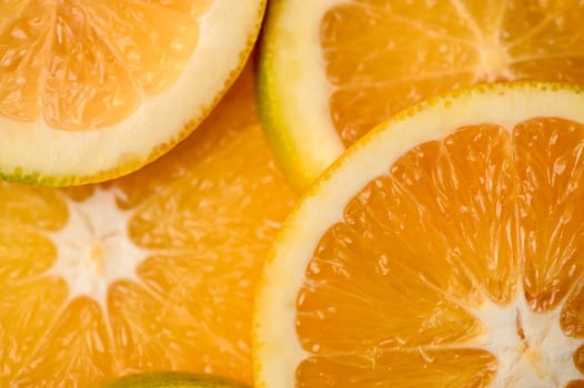 sliced ​​orange laid out on the table as a food background