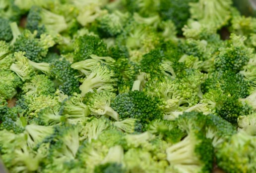 chopped fresh broccoli as background
