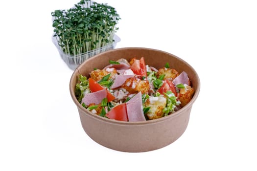 Salad with ham on a white background, for a food delivery site 1