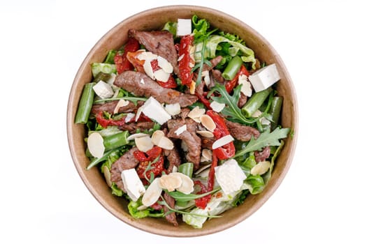 Salad with veal and tofu on a white background, for a food delivery site 2