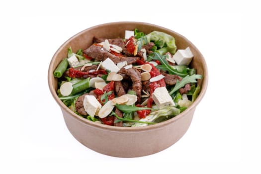 Salad with veal and tofu on a white background, for a food delivery site 1