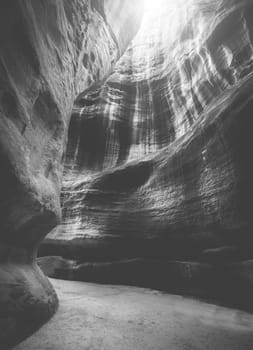 Amazing huge rocky canyon near Petra in Jordan. Black and white photo.