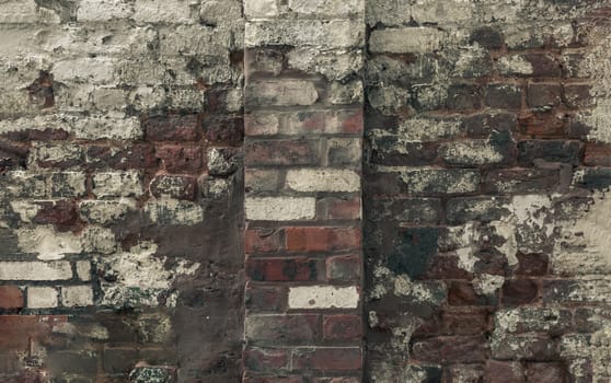 Empty old bricks wall texture. Background of the old vintage bricks wall. Urban background, Rustic style, Space for text, Selective focus.