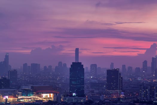 Bangkok downtown cityscape with skyscrapers at evening give the city a modern style. No focus, specifically.
