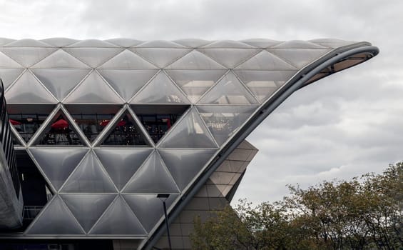 London, England - Oct 16, 2023 - The Lattice Roof structure of Crossrail Place at Canary Wharf. View of Canary Wharf Station Cross Rail, One of the longest contiguous wooden roofs was used, Space for text, Selective focus.