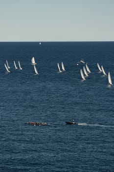 A lot of sail boats and yachts in the sea went on a sailing trip near port Hercules in Monaco, Monte Carlo, sail regatta, race. High quality photo