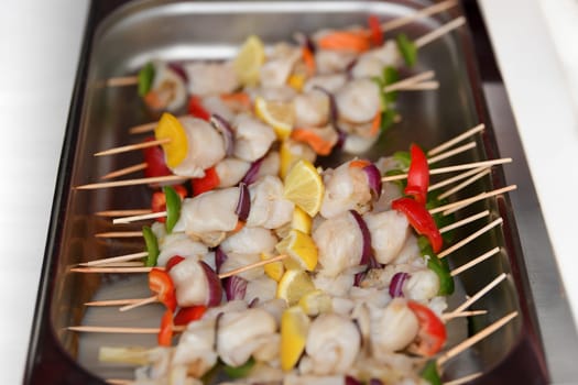 Grilled shells barbecue with lemon and pepper