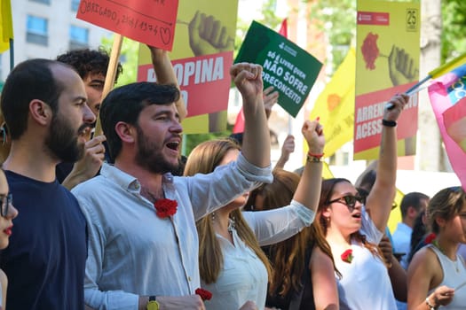 Lisbon, Portugal - April 25, 2023: Anniversary celebration of The Carnation Revolution aka the 25 April Revolution (25 de Abril) by demonstration march