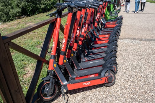 16.06.2023, Antalya, Turkey. Electric scooters for Public Use, Standing on a city street, Public mobile Transport. Electric scooters for rent, for rent An electric scooter is an economical vehicle