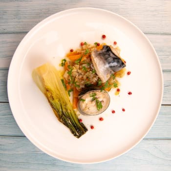 RECIPE FOR PAK CHOI MACKEREL FILLETS, GARNISHED WITH FENNEL, CARROT, SHALLOT AND GARLIC FLAVOURED WITH DRY WHITE WINE, High quality photo