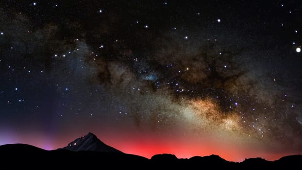 Milky Way over the mountains with stars and nebulae.Milky way galaxy with stars and space dust in the universe.