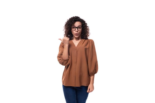 young caucasian lady with curly hair surprised on white background with copy space.