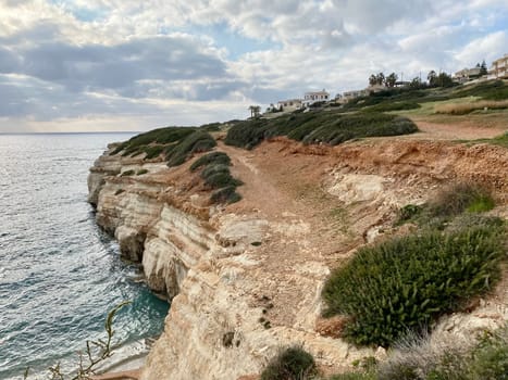 Caves in Yellow rock in Cyprus, Mediterranean sea, sky, Cyprus summer sea rock water. High quality FullHD footage