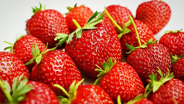 Strawberries. Healthy fresh summer fruit. Background with food. Yoghurt with fresh fruit.