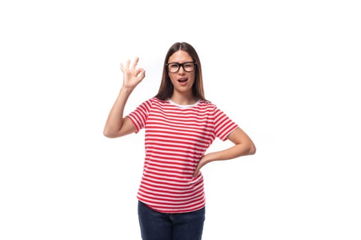 young well-groomed european promoter woman with straight black hair in glasses tells the news on a white background with copy space.