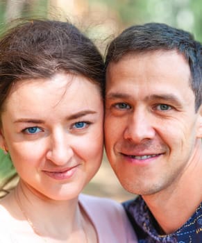 Close-up of the man and woman's face close to each other. Love and romantic relationships.