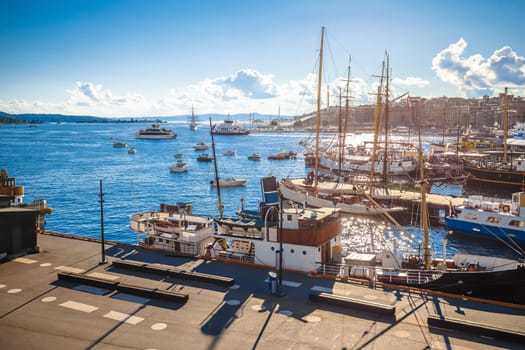 Scenic harbor of Oslo in Aker Brygge view from the hill, capital city of Norway