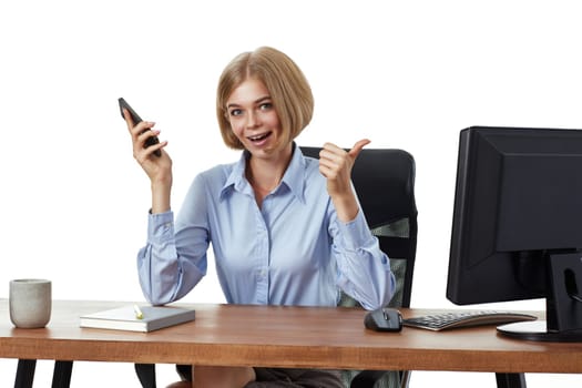 pretty blonde business woman using phone and showing thumbs up gesture in the office