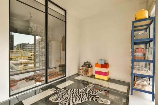 a living room with zebra rugs on the floor and large windows looking out onto the cityscapea