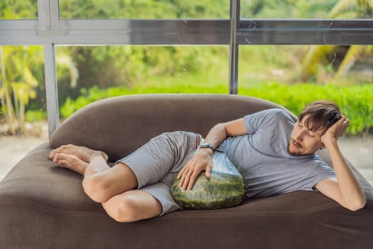 A humorous image: a pregnant woman and her husband playfully use a watermelon in place of a belly, comically highlighting the challenges of navigating with a pregnant bump.