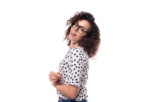 young stylish caucasian woman with curly perm hair looks happy and confident.