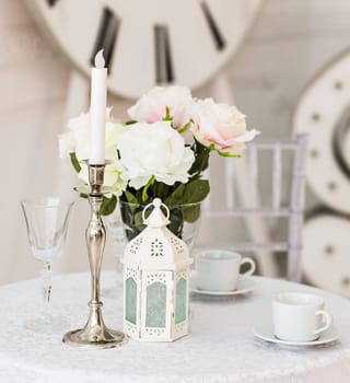 White Living room interior design with artificial flower vase.