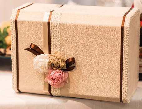 Vintage gift box. Beige box with gifts