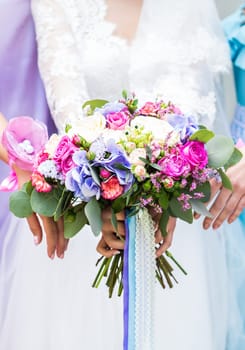 Close up of bride and bridesmaids bouquet.