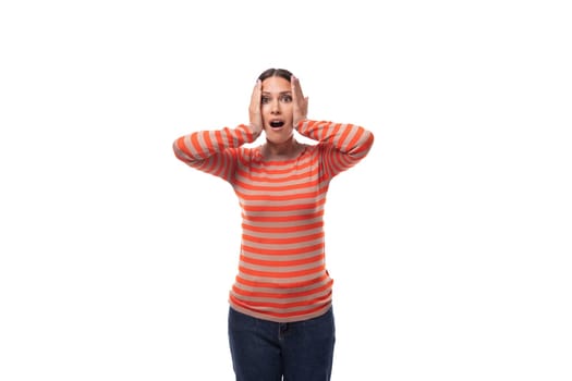 young puzzled brunette lady dressed in a casual striped sweater thought.