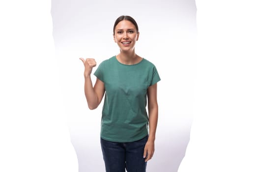 young slim woman dressed in a green basic t-shirt with branding print space.