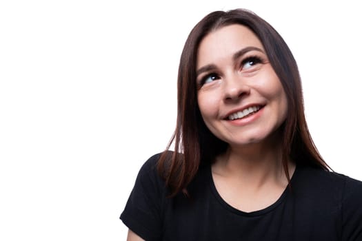 Young beautiful woman with brown eyes wearing a black T-shirt.