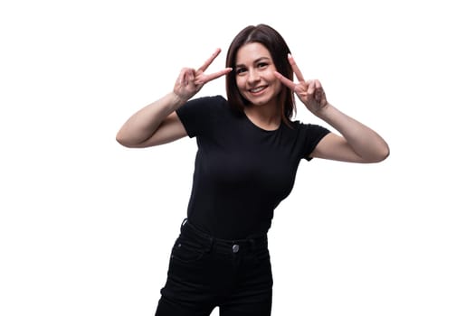 Young beautiful woman with brown eyes wearing a black T-shirt.