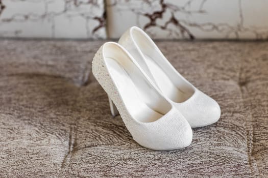 Elegant beautiful white shoes for a bride