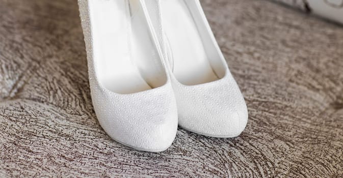 Elegant beautiful white shoes for a bride