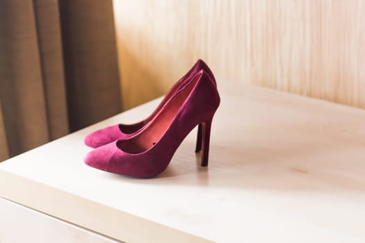 crimson woman beautiful shoes on high heels