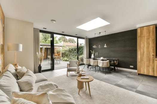 a living room with wood paneled walls and white rugs on the floor in front of the couches