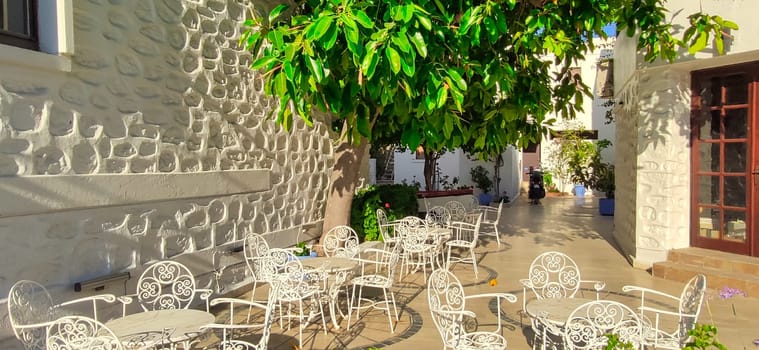 Empty outdoor restaurant table on the coast Turkiye street download photo