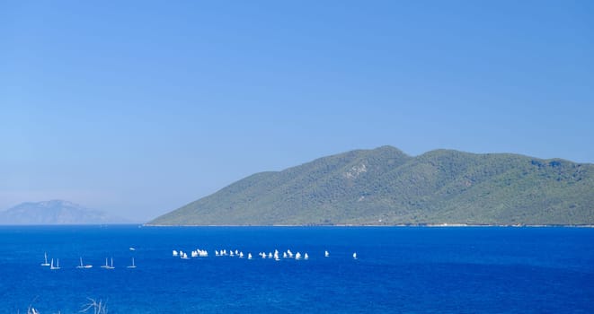 Sailing in the wind through the waves at the Sea. download photo