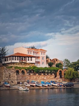 The old town of Nessebar, UNESCO world heritage on the Black Sea coastline, Burgas Region, Bulgaria. Sightseeing view with a mixture of ancient ruins and modern hotel resort on the coast
