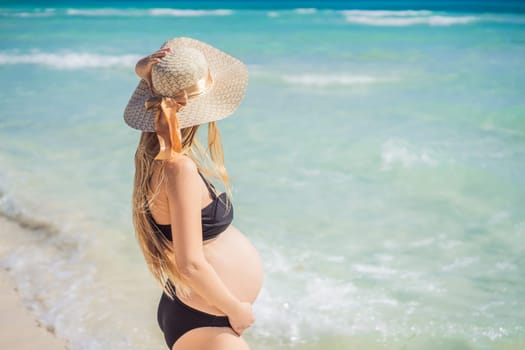 Radiant and expecting, a pregnant woman stands on a pristine snow-white tropical beach, celebrating the miracle of life against a backdrop of natural beauty.