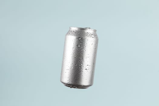 Aluminium beer or soda drinking can isolated on cyan