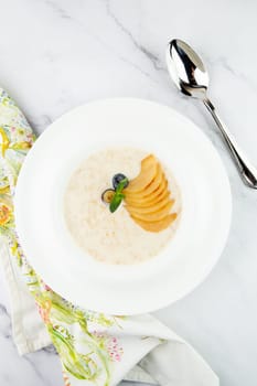 healthy breakfast with fruits in a white plate