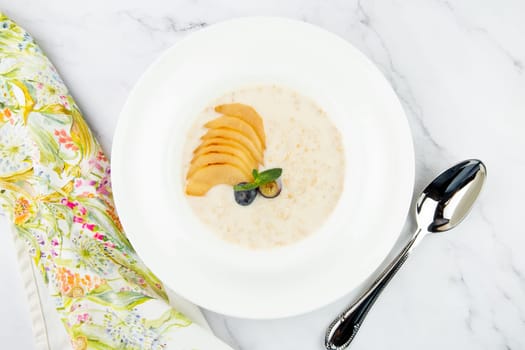 healthy breakfast with fruits in a white plate