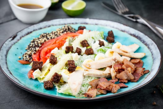 different types of meat, sesame seeds, greens and croutons